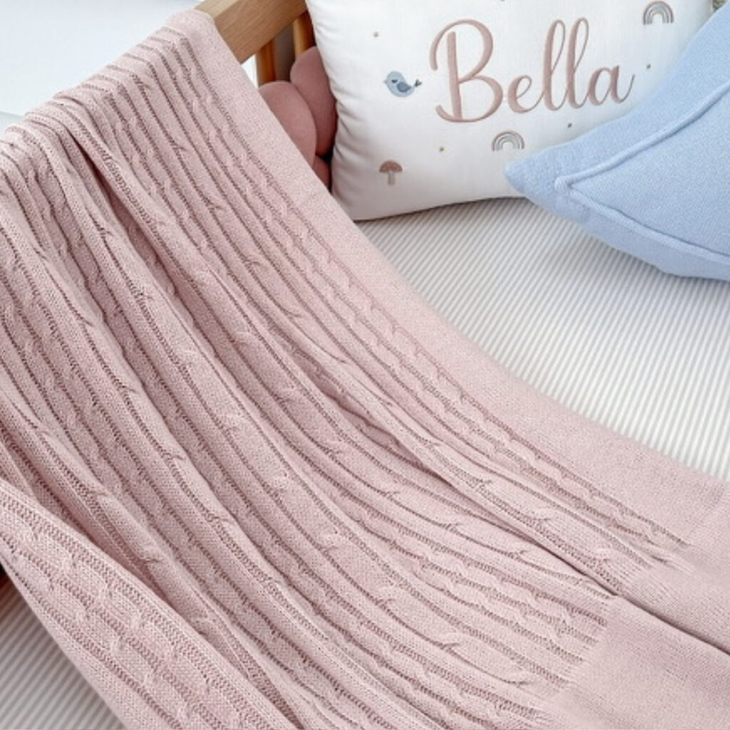 Mantinha de tricot rosa claro